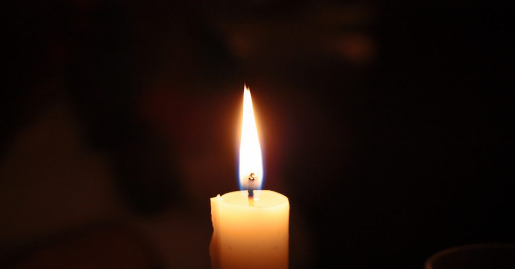 single lit candle