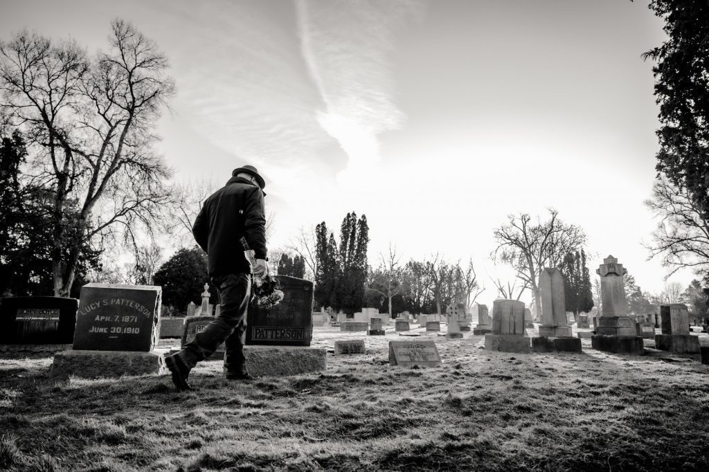 man in cemetery