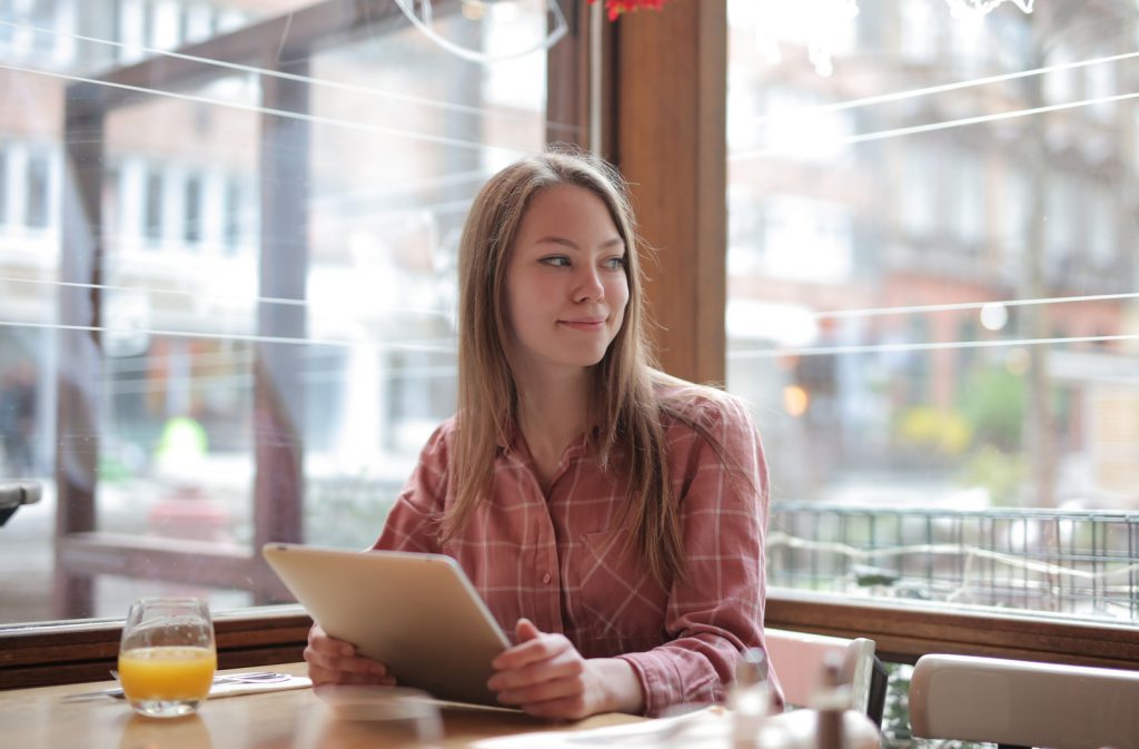 woman with iPad