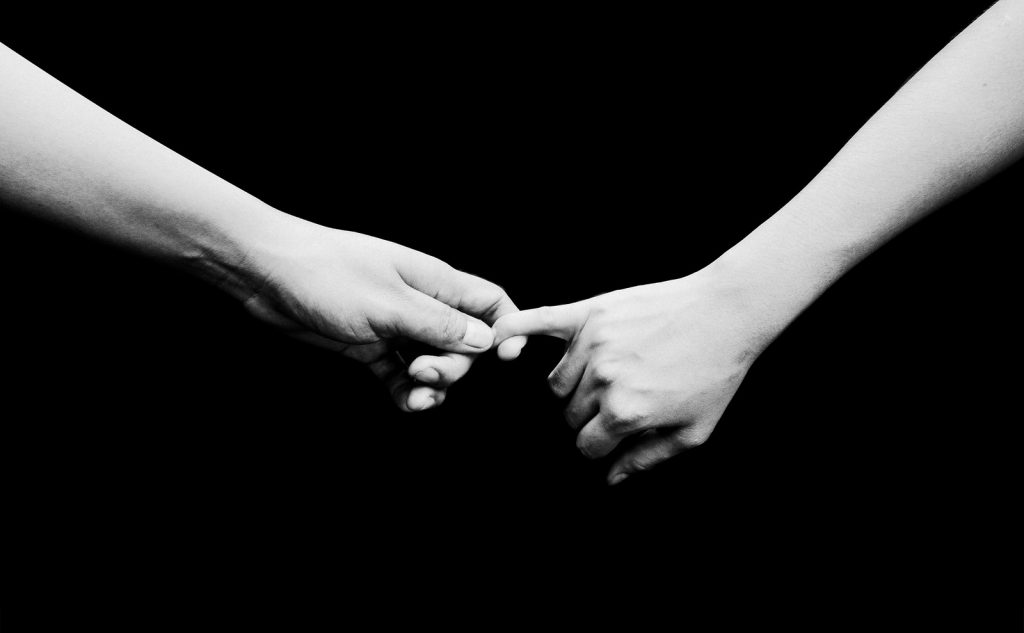 two hands b&w