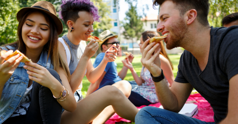 People eating outside.
