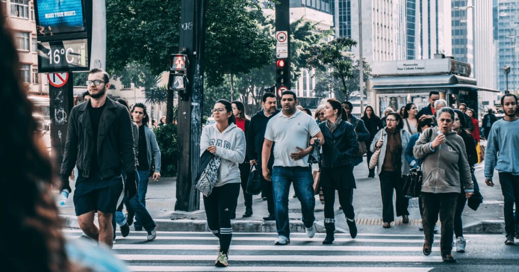 People walking on city street.