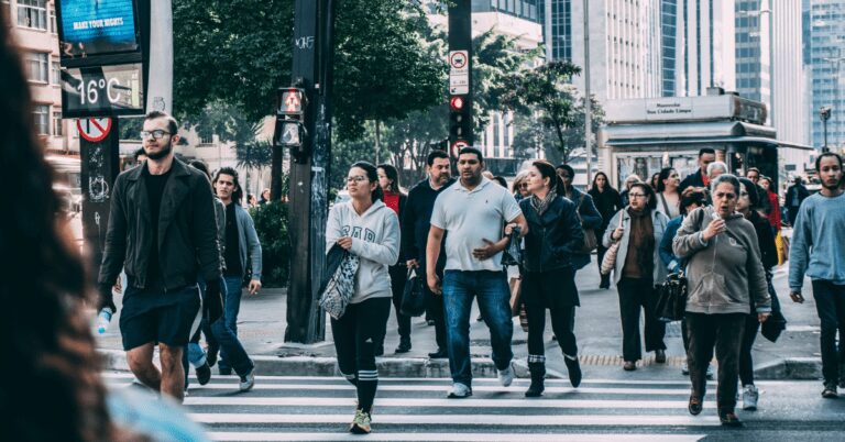 People walking on city street.