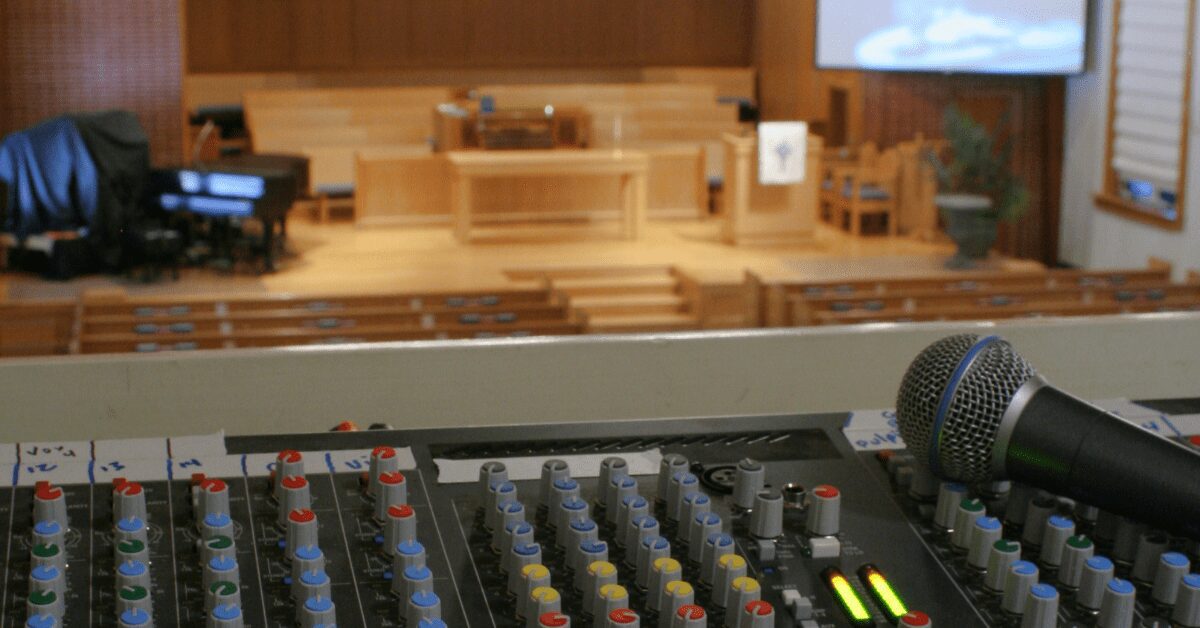 Soundboard and mic in church
