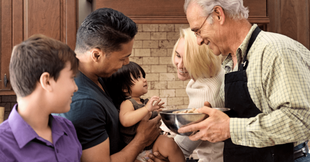 Family in the kitchen cooking.