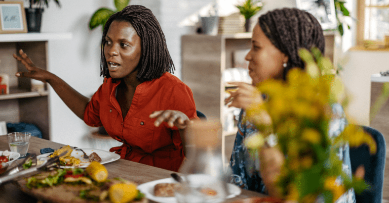 women talking over dinner