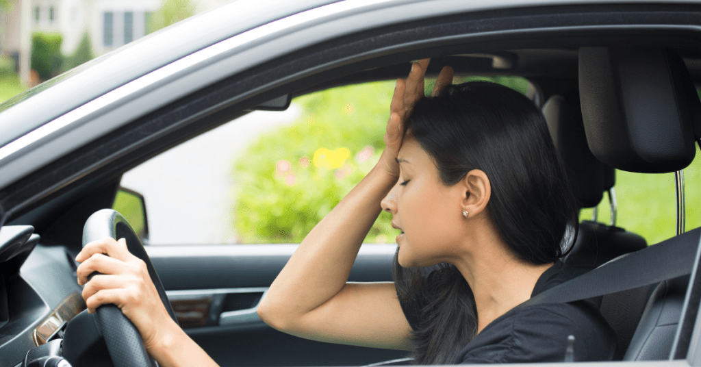 frustrated driver behind the wheel