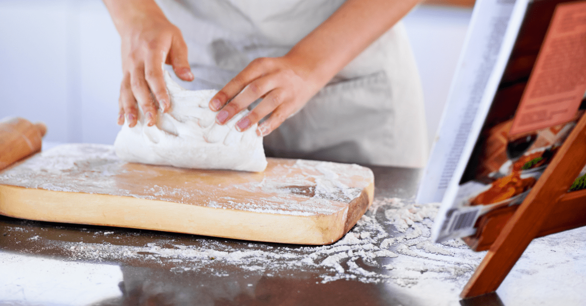 following a recipe to make their own dough