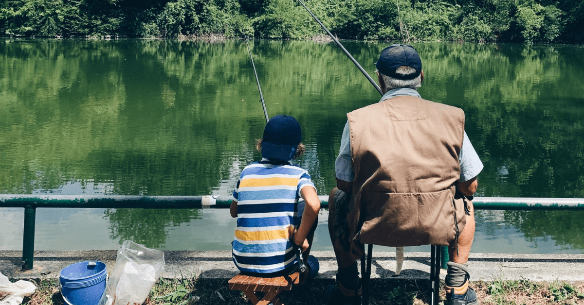 old man and boy fishing