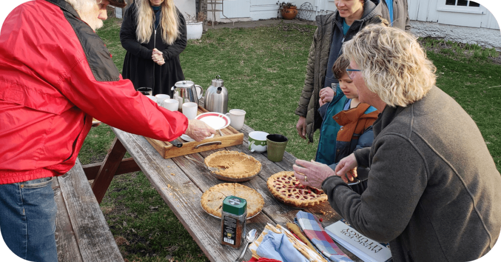 Community members gathering for Pie+Prayer