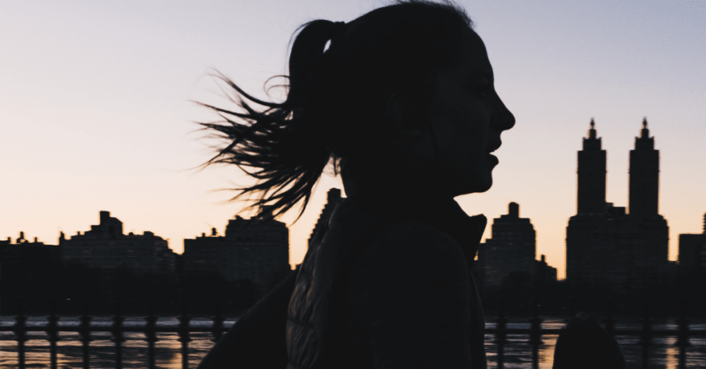 silhouette of woman running