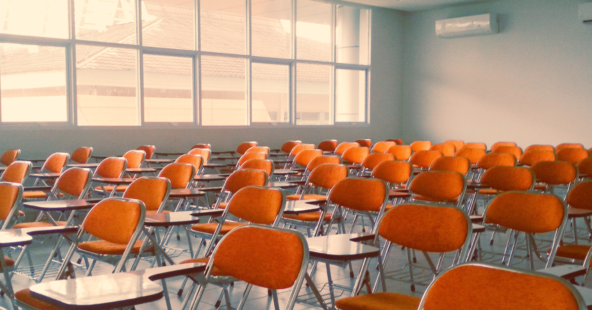 orange desks in classroom