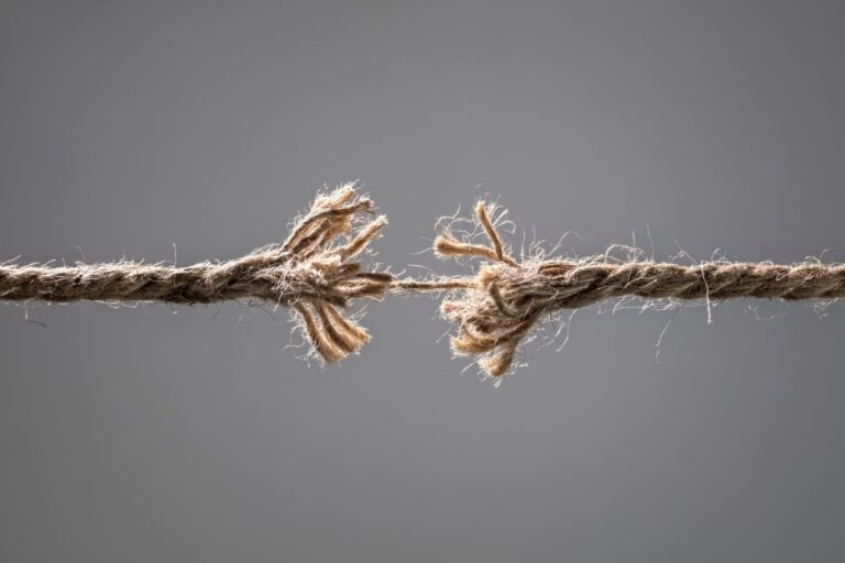 Frayed rope about to break concept for stress, problem or fragility