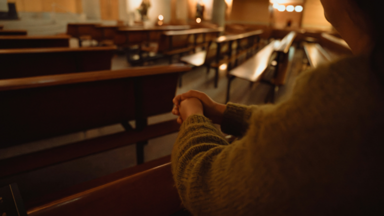 photo of a person alone in a church