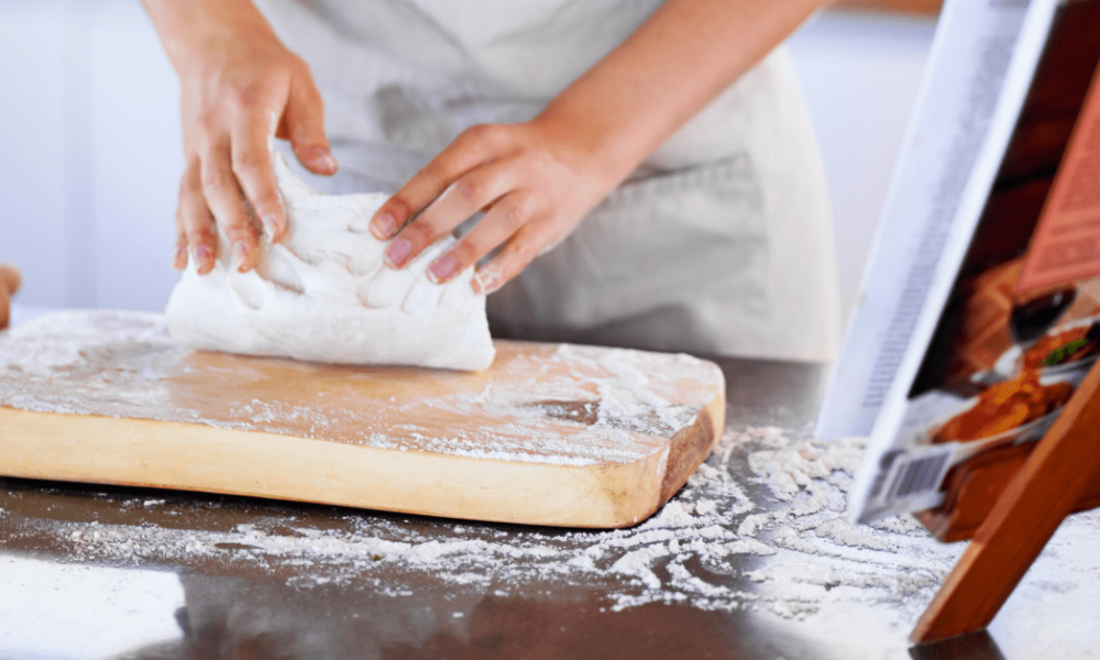 following a recipe to make their own dough