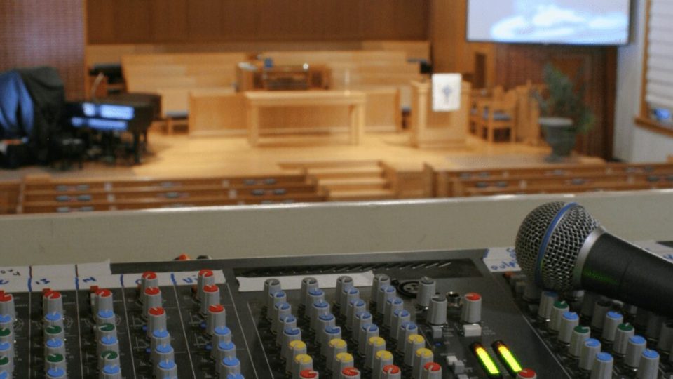 Soundboard and mic in church